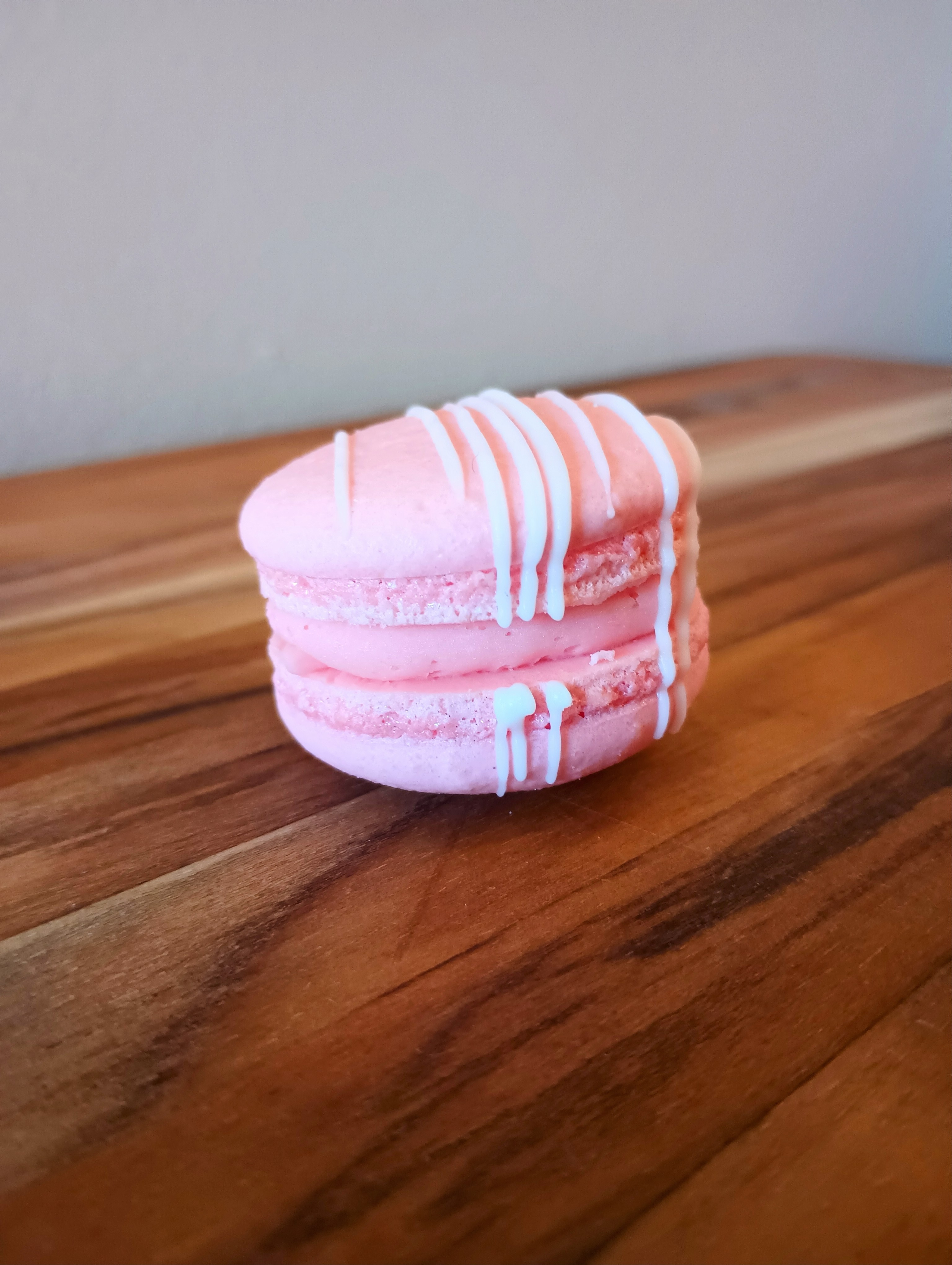 A pink raspberry macaron
